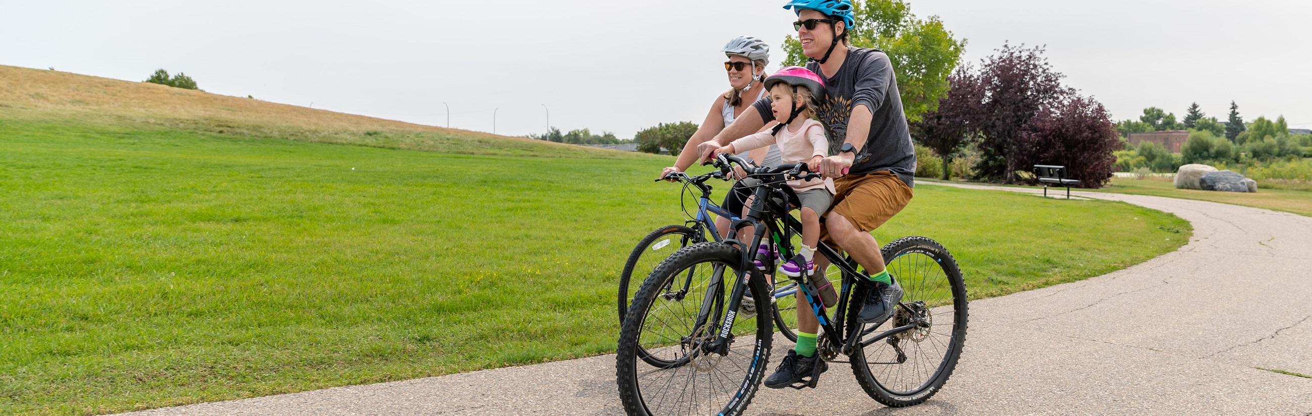 Image of biking family